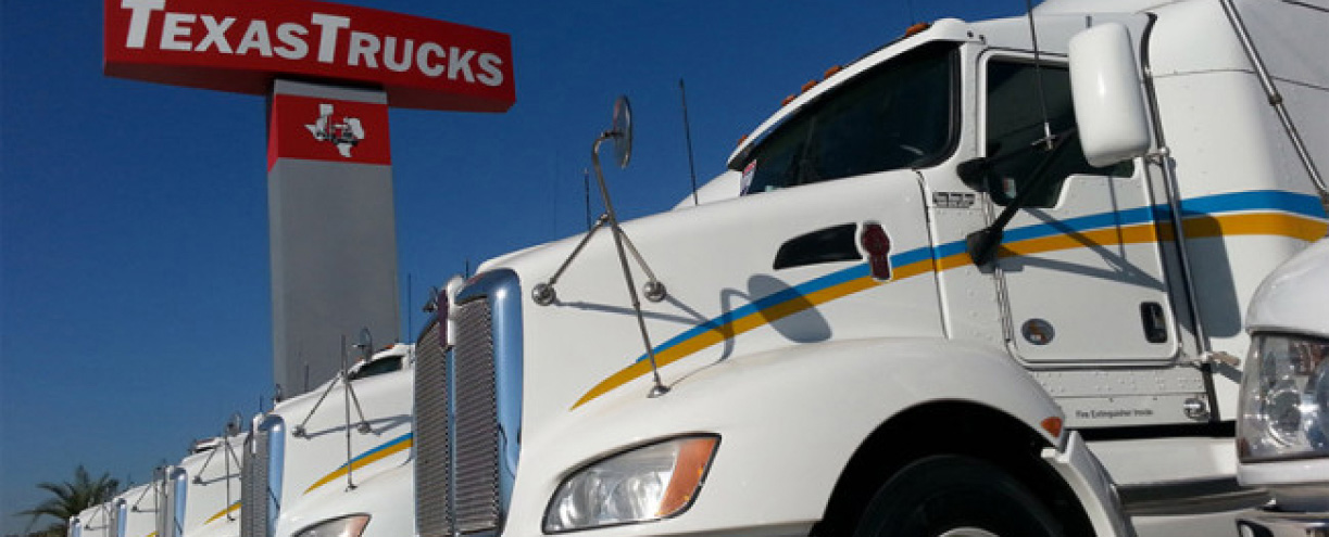 Line of trucks at Texas Truck Sales